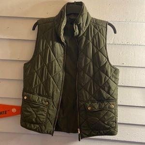 Woman’s army green quilted vest